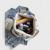 Szandra™ - Kötéllel díszített bőrönd részletei